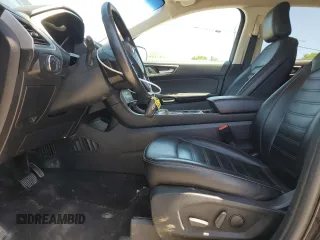 2020 Ford Edge SEL с VIN 2FMPK4J94LBA81516, выставлен на аукционе Copart как лот 56176725 с пробегом 129 952 миль миль и Списание • Salvage title. История ставок и продаж доступна на DreamBid. Изображение 7.