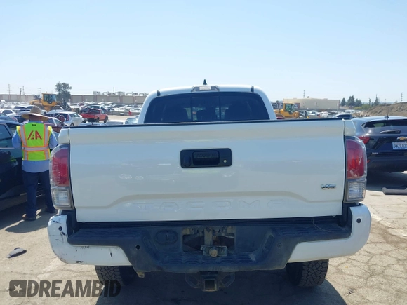 2021 Toyota Tacoma 4WD SR5 with VIN 3TMDZ5BN4MM106693, listed as a IAAI auction lot 41986838 with 52,510 mi miles. Bid and sale history available at carsss.com. Image 16.