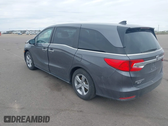 2018 Honda Odyssey EX-L z VIN 5FNRL6H72JB090127, wystawiony jako IAAI lot #42167788 z przebiegiem 114 984 mil mil oraz . Historia ofert i sprzedaży dostępna na DreamBid. Obrazek 3.