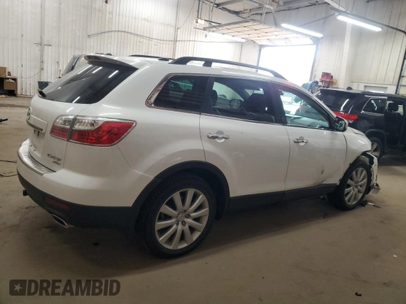 2010 Mazda CX-9 Grand Touring z VIN JM3TB3MA8A0203402, wystawiony jako Copart lot #52953665 z przebiegiem 182 253 mil mil oraz Szkoda całkowita • Salvage title. Historia ofert i sprzedaży dostępna na DreamBid. Obrazek 3.