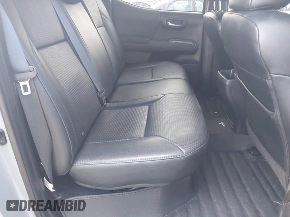 2020 Toyota Tacoma SR5 with VIN 3TMDZ5BN3LM080702, listed as a IAAI auction lot 42463811 with 70,185 mi miles and . Bid and sale history available at DreamBid. Image 8.