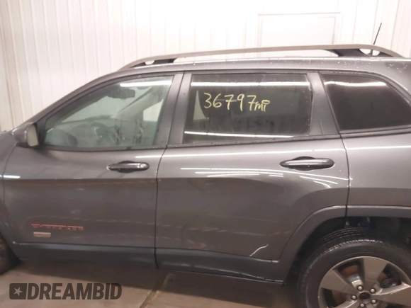2017 Jeep Cherokee Latitude with VIN 1C4PJLCS9HW510429, listed as a IAAI auction lot 41077227 with 36,797 mi miles and . Bid and sale history available at DreamBid. Image 14.