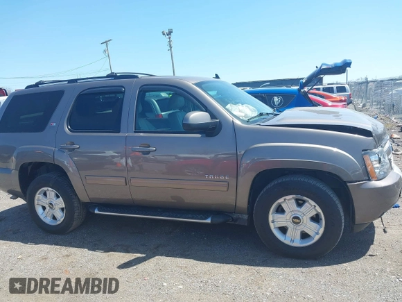 2013 Chevrolet Tahoe LT with VIN 1GNSKBE09DR325729, listed as a IAAI auction lot 41989587 with 186,361 mi miles and . Bid and sale history available at DreamBid. Image 13.
