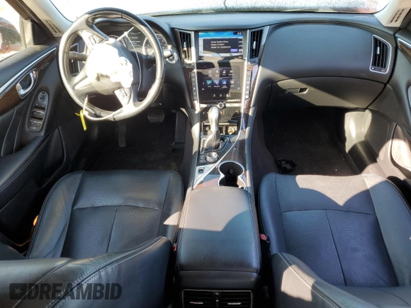 2015 Infiniti Q50 Premium with VIN JN1BV7AP7FM355136, listed as a Copart auction lot 56586325 with 101,384 mi miles and Salvage title. Bid and sale history available at DreamBid. Image 8.