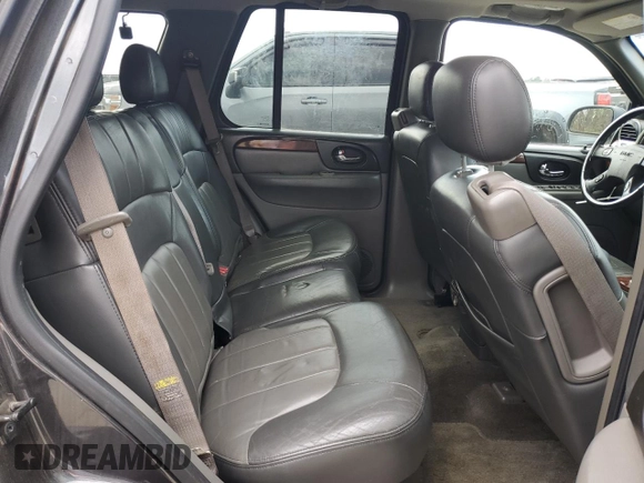 2003 GMC Envoy SLT z VIN 1GKDS13S332326838, wystawiony jako Copart lot #48888545 z przebiegiem 197 969 mil mil oraz Czysty tytuł • Clean title. Historia ofert i sprzedaży dostępna na DreamBid. Obrazek 11.