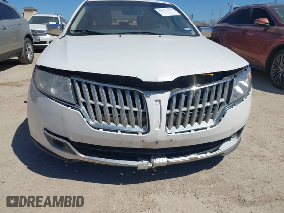 2012 Lincoln MKZ with VIN 3LNHL2GC2CR813653, listed as a IAAI auction lot 41751793 with 216,961 mi miles and . Bid and sale history available at DreamBid. Image 6.