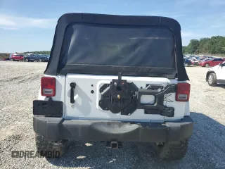 2015 Jeep Wrangler Unlimited Sahara with VIN 1C4BJWEG3FL584920, listed as a Copart auction lot 61843525 with 62,876 mi miles and Salvage title. Bid and sale history available at DreamBid. Image 6.
