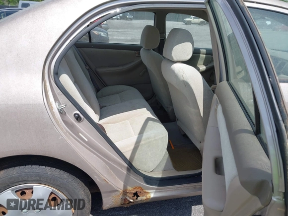 2003 Toyota Corolla CE with VIN 2T1BR32E03C102501, listed as a IAAI auction lot 42158080 with 62,688 mi miles and . Bid and sale history available at DreamBid. Image 8.