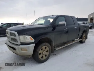 2014 Ram 3500 Laramie with VIN 3C63R3ML6EG325772, listed as a Copart auction lot 87158104 with 495,759 mi miles and Salvage Title. Bid and sale history available at carsss.com. Image 1.