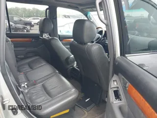 2004 Lexus GX 470 with VIN JTJBT20XX40032417, listed as a IAAI auction lot 42150885 with 180,568 mi miles. Bid and sale history available at carsss.com. Image 8.