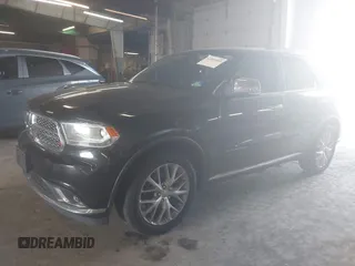 2014 Dodge Durango Citadel with VIN 1C4RDJEG1EC466162, listed as a IAAI auction lot 42560400 with 154,628 mi miles and . Bid and sale history available at DreamBid. Image 2.