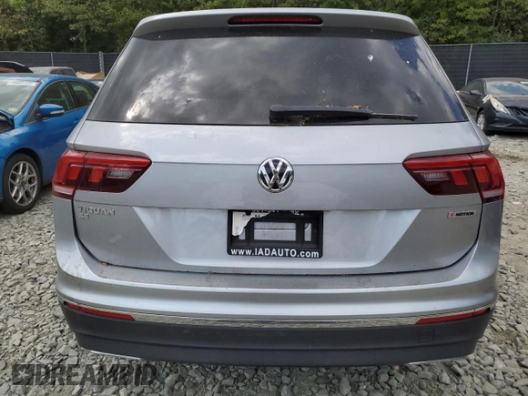 2020 Volkswagen Tiguan SE with VIN 3VV2B7AX4LM022562, listed as a Copart auction lot 69816034 with 61,789 mi miles and Salvage Title. Bid and sale history available at DreamBid. Image 6.