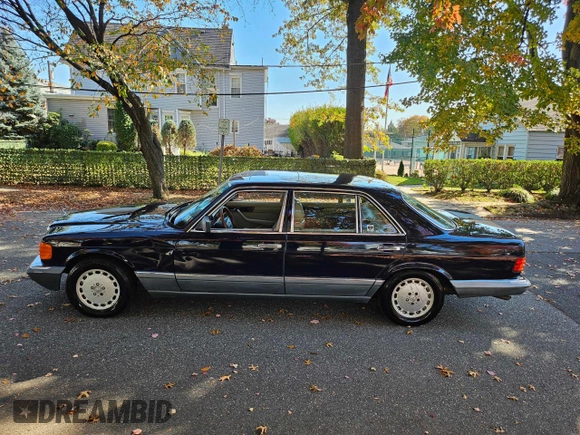 1988 Mercedes-Benz 560 with VIN WDBCA39D0JA410101, listed as a Copart auction lot 78961194 with 247,459 mi miles and Clean Title. Bid and sale history available at DreamBid. Image 9.