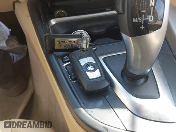 2014 BMW 3 Series 320i xDrive with VIN WBA3C3C56EK200175, listed as a IAAI auction lot 42617731 with 96,596 mi miles and . Bid and sale history available at DreamBid. Image 11.