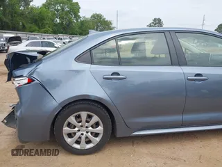 2021 Toyota Corolla LE with VIN JTDEPMAE8MJ162896, listed as a IAAI auction lot 41942669 with 99,131 mi miles. Bid and sale history available at carsss.com. Image 18.