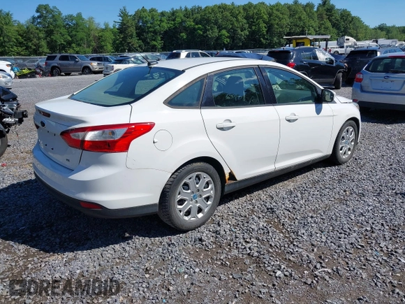 2012 Ford Focus SE with VIN 1FAHP3F27CL218986, listed as a IAAI auction lot 42633997 with 163,414 mi miles and . Bid and sale history available at DreamBid. Image 4.