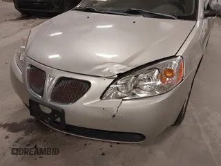 2006 Pontiac G6 1SV z VIN 1G2ZF55B264218234, wystawiony jako IAAI lot #41875165 z przebiegiem 226 618 mil mil oraz . Historia ofert i sprzedaży dostępna na DreamBid. Obrazek 6.