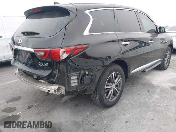 2019 Infiniti QX60 LUXE with VIN 5N1DL0MN7KC500202, listed as a IAAI auction lot 41229623 with 103,626 mi miles. Bid and sale history available at carsss.com. Image 4.