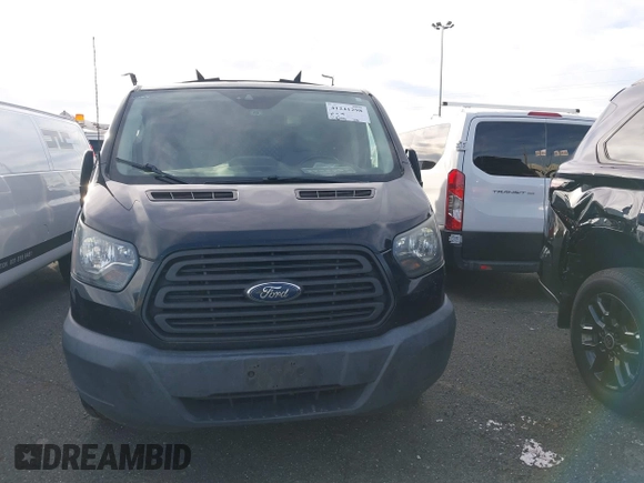 2015 Ford Transit Cargo with VIN 1FTYE1YM2FKA87298, listed as a IAAI auction lot 41241298 with 225,796 mi miles and . Bid and sale history available at DreamBid. Image 11.