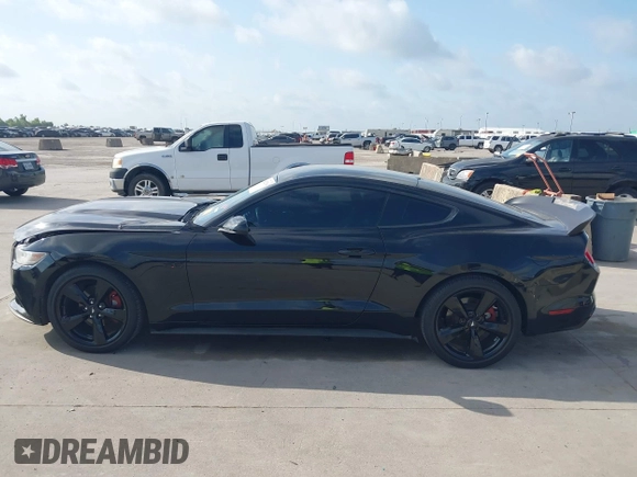 2015 Ford Mustang EcoBoost with VIN 1FA6P8TH3F5418205, listed as a IAAI auction lot 42552784 with 124,782 mi miles and . Bid and sale history available at DreamBid. Image 14.
