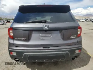 2020 Honda Passport Touring z VIN 5FNYF8H9XLB007336, wystawiony jako Copart lot #51012975 z przebiegiem 74 620 mil mil oraz Szkoda całkowita • Salvage title. Historia ofert i sprzedaży dostępna na DreamBid. Obrazek 6.