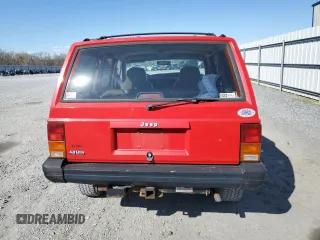 1995 Jeep Cherokee Sport with VIN 1J4FJ68S2SL666126, listed as a Copart auction lot 50496735 with 158,523 mi miles and Salvage title. Bid and sale history available at DreamBid. Image 6.