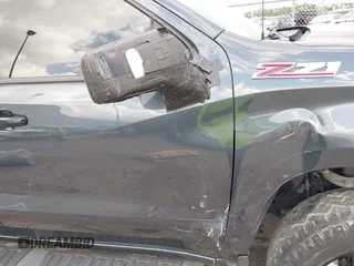 2021 Chevrolet Silverado 1500 LT Trail Boss with VIN 1GCPYFED6MZ137614, listed as a IAAI auction lot 40932872 with 63,087 mi miles and . Bid and sale history available at DreamBid. Image 6.