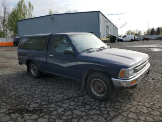 1990 Toyota Pickup DX с VIN JT4RN81P7L5065454, выставлен на аукционе Copart как лот 52913465 с пробегом 366 591 миль миль и Списание • Salvage title. История ставок и продаж доступна на DreamBid. Изображение 4.