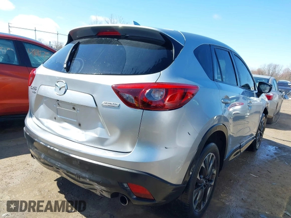 2016 Mazda CX-5 Grand Touring with VIN JM3KE4DY9G0795360, listed as a IAAI auction lot 41933991 with 176,373 mi miles. Bid and sale history available at carsss.com. Image 4.