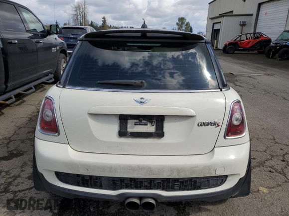 2009 MINI Hardtop S with VIN WMWMF73569TW84934, listed as a Copart auction lot 51344975 with 123,929 mi miles and Salvage title. Bid and sale history available at DreamBid. Image 6.