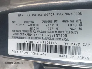 2016 Mazda Mazda3 i Sport with VIN JM1BM1T78G1301115, listed as a IAAI auction lot 41760794 with 113,317 mi miles. Bid and sale history available at carsss.com. Image 9.