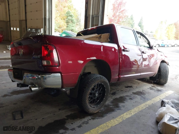 2017 Ram 1500 Big Horn with VIN 1C6RR7LM6HS881041, listed as a IAAI auction lot 40971022 with 111,179 mi miles. Bid and sale history available at carsss.com. Image 4.