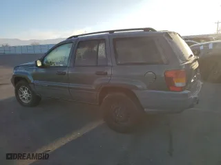 2002 Jeep Grand Cherokee Laredo with VIN 1J4GW48N72C155063, listed as a Copart auction lot 82839234 with 165,397 mi miles and Clean Title. Bid and sale history available at carsss.com. Image 2.