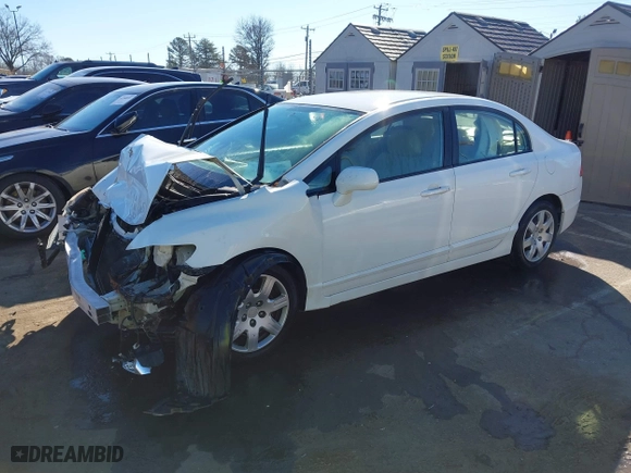 2006 Honda Civic Sdn LX with VIN 1HGFA16596L001799, listed as a IAAI auction lot 41262945 with 161,946 mi miles. Bid and sale history available at carsss.com. Image 19.