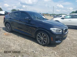 2020 BMW X4 xDrive30i z VIN 5UX2V1C04LLE67552, wystawiony jako IAAI lot #42248462 z przebiegiem 84 531 mil mil oraz . Historia ofert i sprzedaży dostępna na DreamBid. Obrazek 1.