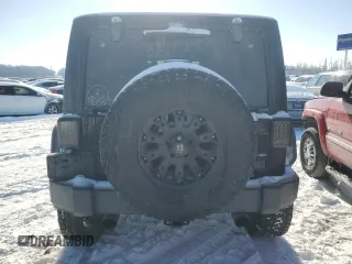 2013 Jeep Wrangler Unlimited Sport with VIN 1C4BJWDG7DL621806, listed as a Copart auction lot 87604805 with 158,885 mi miles and Salvage title. Bid and sale history available at DreamBid. Image 6.