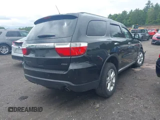 2013 Dodge Durango Crew with VIN 1C4RDJDG4DC690249, listed as a IAAI auction lot 42329188 with 225,504 mi miles and . Bid and sale history available at DreamBid. Image 4.