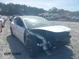 2022 Tesla Model 3 Long Range with VIN 5YJ3E1EB0NF106570, listed as a IAAI auction lot 41832622 with 52,679 mi miles and . Bid and sale history available at DreamBid. Image 1.
