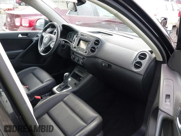 2016 Volkswagen Tiguan SE with VIN WVGBV7AX5GW511804, listed as a IAAI auction lot 41817295 with 75,831 mi miles and . Bid and sale history available at DreamBid. Image 5.