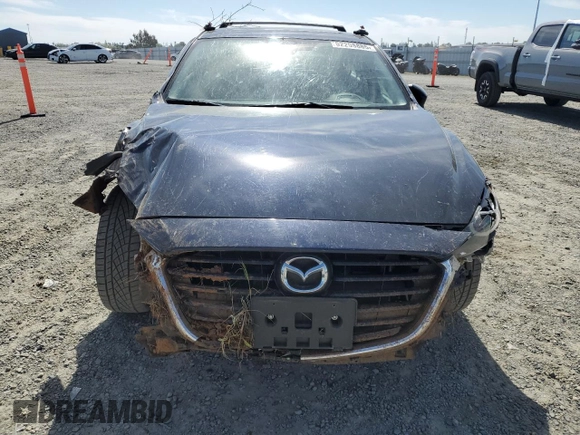 2017 Mazda 3 Grand Touring z VIN 3MZBN1M3XHM148604, wystawiony jako Copart lot #52258885 z przebiegiem Nie podano mil oraz Szkoda całkowita • Salvage title. Historia ofert i sprzedaży dostępna na DreamBid. Obrazek 5.
