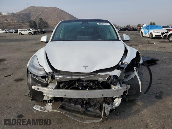 2023 Tesla Model Y Long Range with VIN 7SAYGDEE5PA125887, listed as a Copart auction lot 43188655 with 31,472 mi miles and Salvage Title. Bid and sale history available at DreamBid. Image 5.