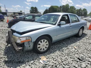 2003 Mercury Grand Marquis LS Premium z VIN 2MEFM75WX3X665058, wystawiony jako Copart lot #55266225 z przebiegiem 120 904 mil mil oraz Szkoda całkowita • Salvage title. Historia ofert i sprzedaży dostępna na DreamBid. Obrazek 1.