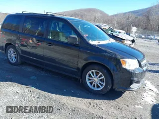 2016 Dodge Grand Caravan SXT with VIN 2C4RDGCG9GR318552, listed as a IAAI auction lot 41612185 with 108,730 mi miles. Bid and sale history available at carsss.com. Image 1.