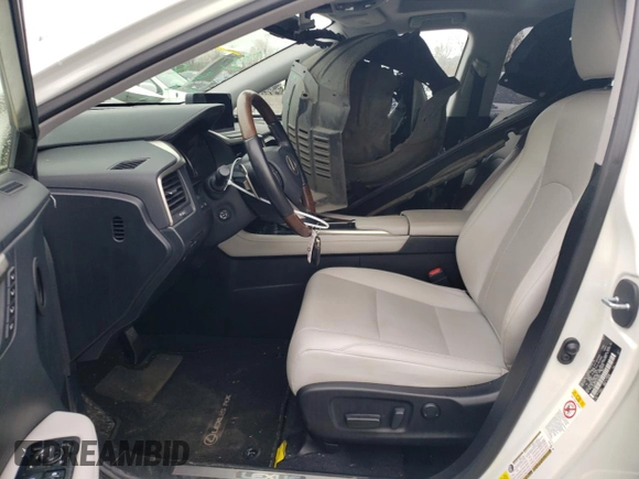 2020 Lexus RX 350L with VIN JTJHZKEA6L2014576, listed as a Copart auction lot 82706154 with 59,775 mi miles and Salvage title. Bid and sale history available at DreamBid. Image 7.