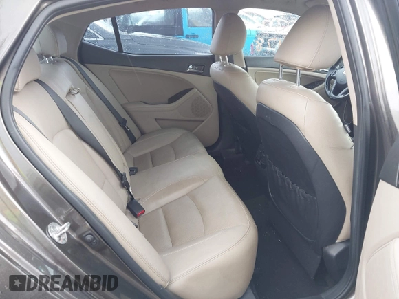 2013 Kia Optima EX z VIN 5XXGN4A79DG181719, wystawiony jako IAAI lot #42372478 z przebiegiem 166 410 mil mil oraz . Historia ofert i sprzedaży dostępna na DreamBid. Obrazek 8.