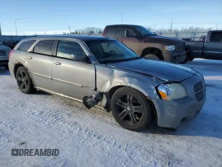 2006 Dodge Magnum R/T z VIN 2D4GV57256H187683, wystawiony jako Copart lot #87879585 z przebiegiem 260 895 mil mil oraz Szkody całkowita. Historia ofert i sprzedaży dostępna na DreamBid. Obrazek 4.