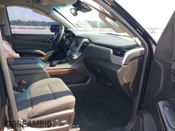 2016 GMC Yukon XL SLE with VIN 1GKS1FKC9GR161876, listed as a IAAI auction lot 39948106 with 60,800 mi miles. Bid and sale history available at carsss.com. Image 5.