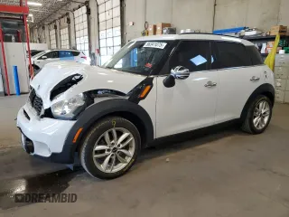 2014 MINI Countryman S with VIN WMWZC3C59EWP29798, listed as a Copart auction lot 56341075 with 92,061 mi miles and Salvage title. Bid and sale history available at DreamBid. Image 1.