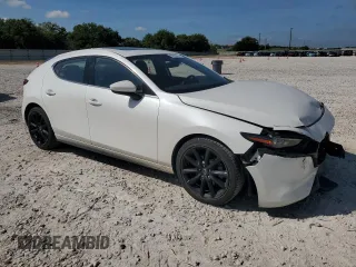 2019 Mazda Mazda3 Hatchback w/Premium Pkg with VIN JM1BPBNM7K1129443, listed as a Copart auction lot 65935074 with 44,567 mi miles and Salvage Title. Bid and sale history available at carsss.com. Image 4.
