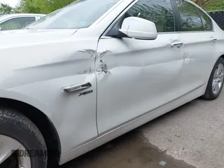 2012 BMW 5 Series 528i xDrive with VIN WBAXH5C58CDW11514, listed as a IAAI auction lot 42131076 with 146,788 mi miles. Bid and sale history available at carsss.com. Image 13.